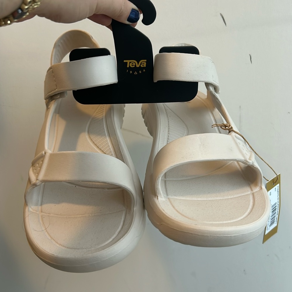 Brand new, with tags TEVA sandals, hurricane drift, tan
